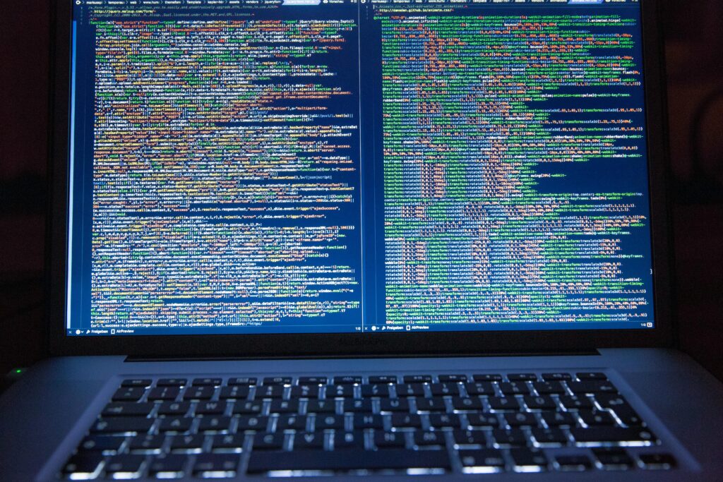 pexels photo 177598 177598 Laptop displaying source code with dual screens for software development.